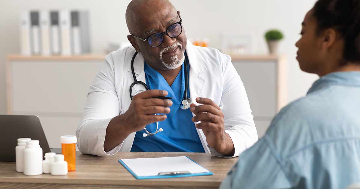 Doctor talking with patient about how asthma is diagnosed