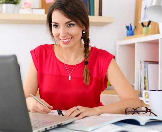 Educator training on her laptop for food allergy safety