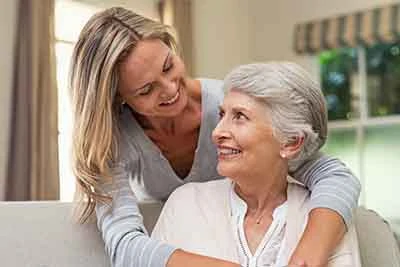 Photo of mother and daughter hugging