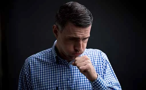 Photo of Man coughing