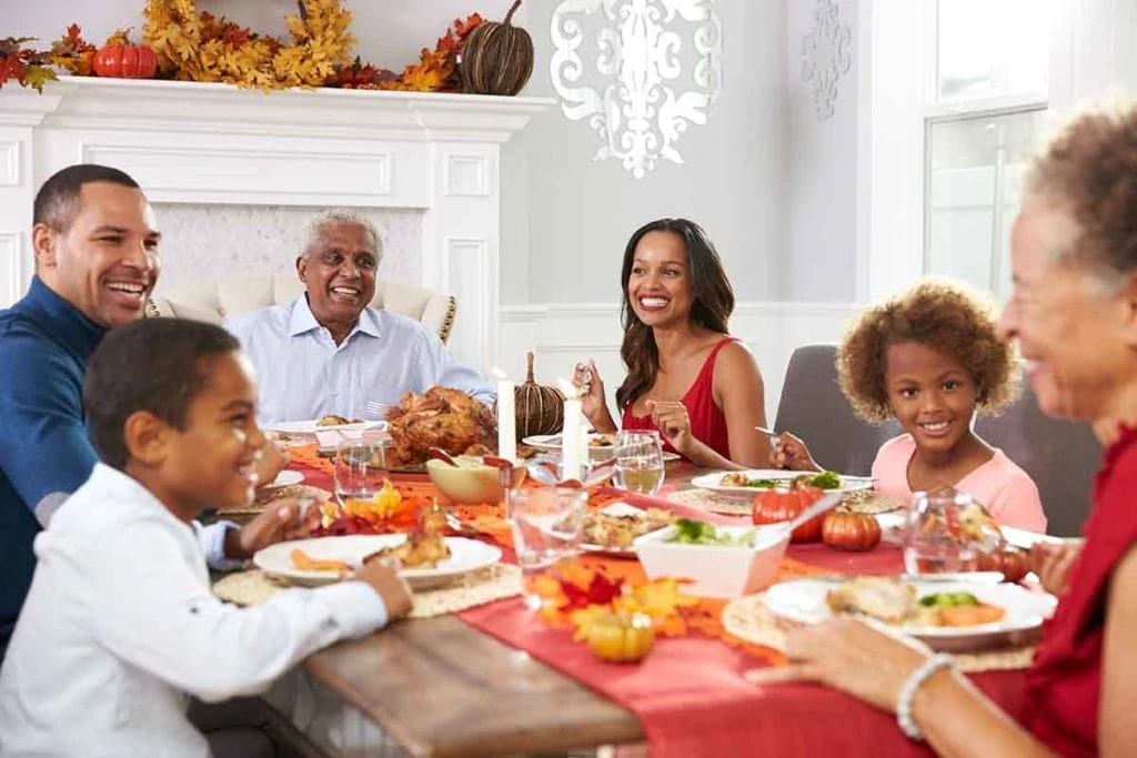 Photo of family having thanksgiving dinner
