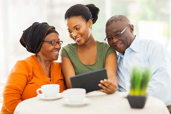 Woman educating community members on health disparities